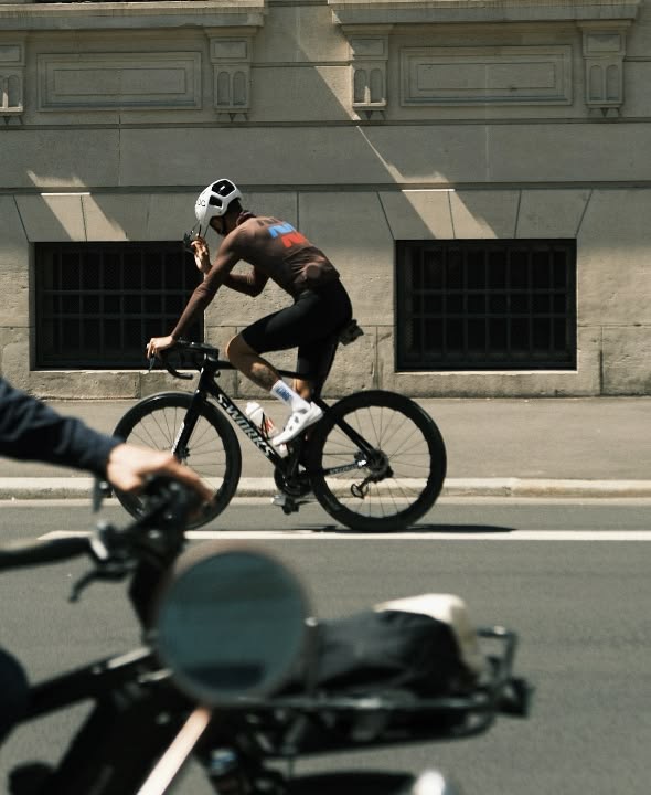 Cyclist riding through a city street